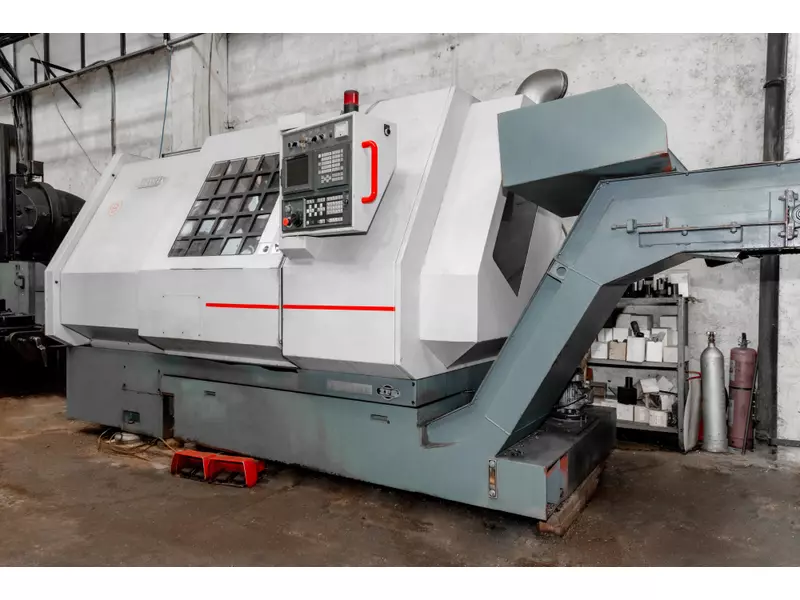 DZ 370 CNC - Capacity: 750 mm turning length, 430 mm turning diameter, 680 mm swing over bed; Spindle: 92 / 80 mm spindle bore, with speeds ranging from 20-3,500 rpm .webp